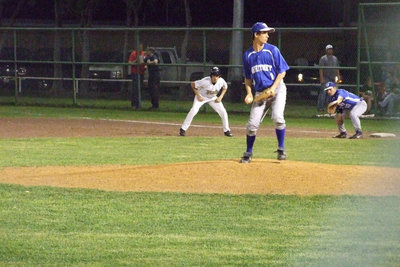 Image: Who’s on first — Alex DeMoss pinch runs for catcher Caden Jacinto.