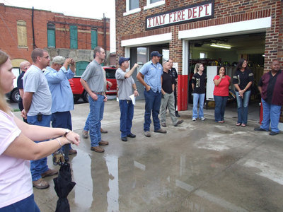 Image: Firefighter’s prayer — All listen as the Firefighter’s Prayer is read by Tommy Sutherland.
