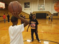Image: Norwood’s Netpoppers — Coach Ken Norwood and his Netpoppers simulate a game in preperation for opening day on Saturday.
