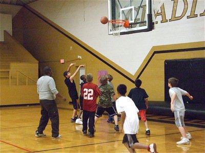 Image: Joseph Celis shoots — Getting ready for the scrimmage.