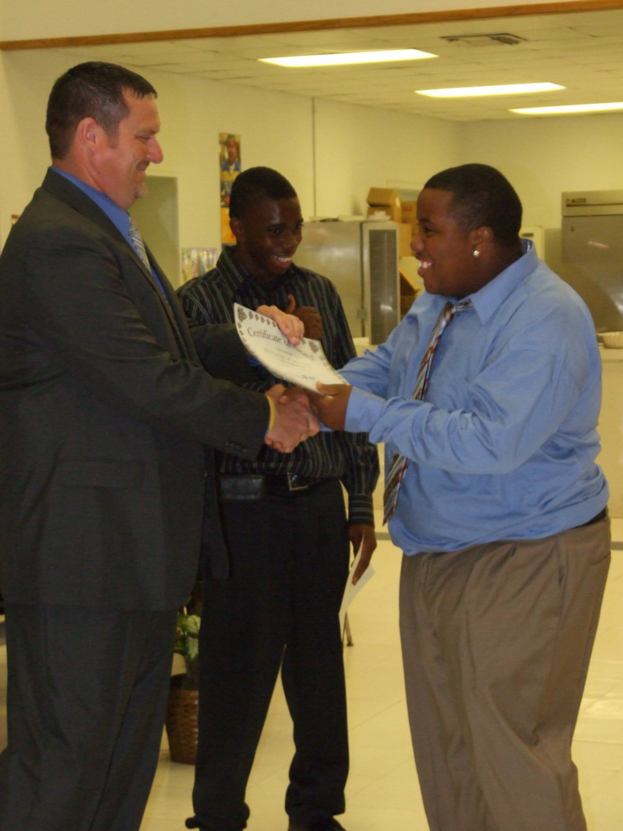 Image: Mr. Everything — What can you possibly give the man who gives so much of himself? Oh, yeah, a Certificate of Award and a handshake. Thanks for everything D.P. Green.