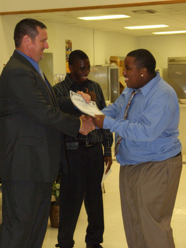 Image: Mr. Everything — What can you possibly give the man who gives so much of himself? Oh, yeah, a Certificate of Award and a handshake. Thanks for everything D.P. Green.