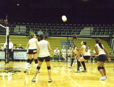 Image: Allyssa gets under it — Alyssa Richards gets the team ready for the score.