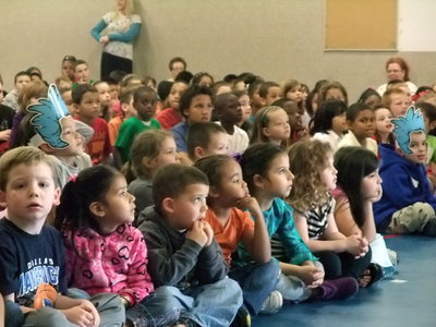 Image: Wrapped up in the skit — These students were intently listening to Stephen F. Austin.