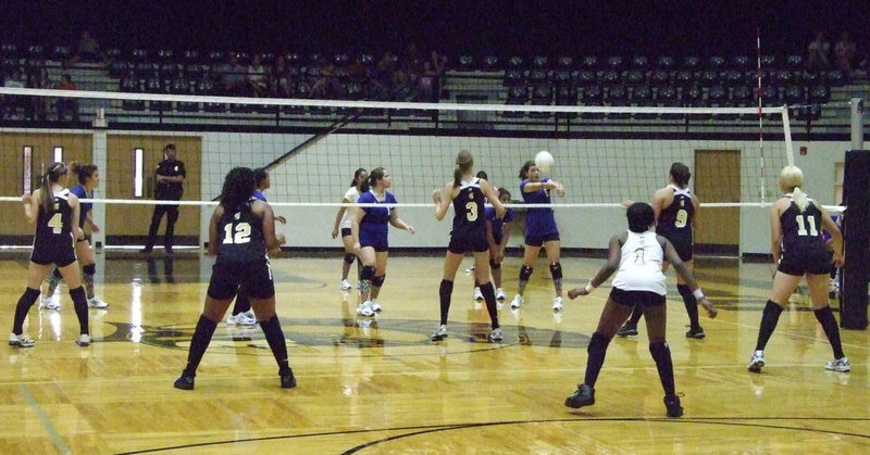 Image: Keene sends it back — The Lady Chargers stay neck and neck with the Lady Gladiators in two of the games.