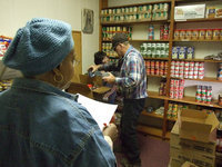Image: Italy Ministerial Alliance Food Pantry — The Italy Ministerial Alliance food pantry has changed their hours to 5:00 pm to 8:00 pm on first Monday of the month. Ruth Tarrent, Bill Youngblood and Karen Mathiowetz work the pantry.