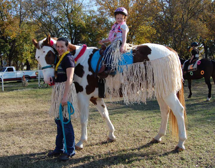 Image: Hula Girls — Most Fun in the Sun costume winner was Lisa Olschewsky and Sadie Hinz with Houdini as “Hula Girls.”
