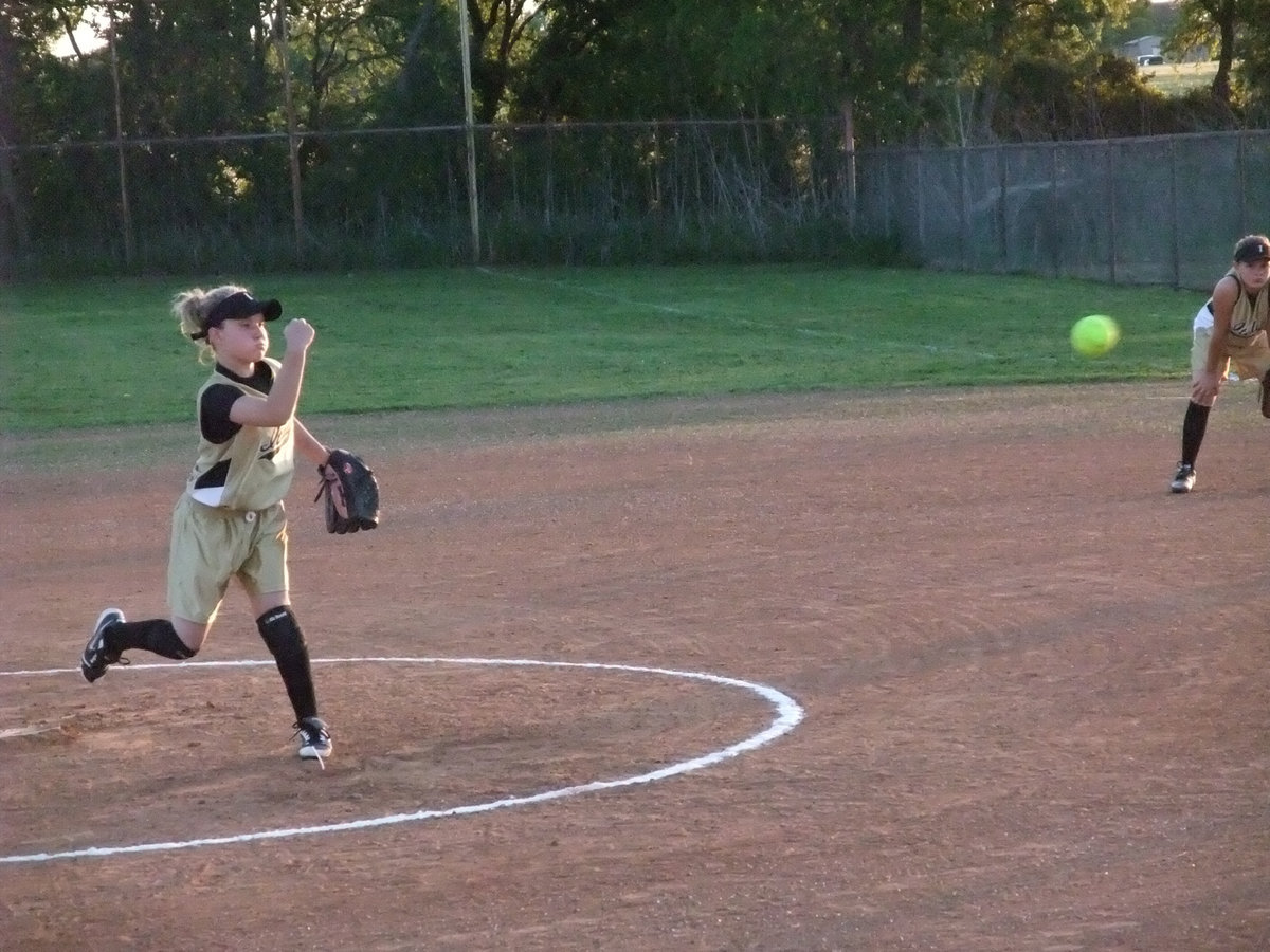 Image: Take that! — Tara Wallis delivers the knockout punch to Hillsboro pitching the whole game helping Italy win 18-2.