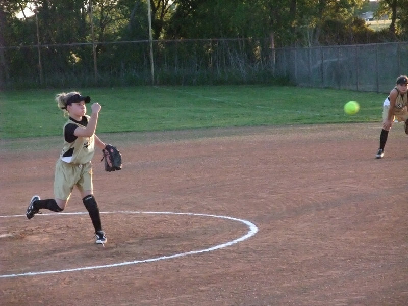 Image: Take that! — Tara Wallis delivers the knockout punch to Hillsboro pitching the whole game helping Italy win 18-2.