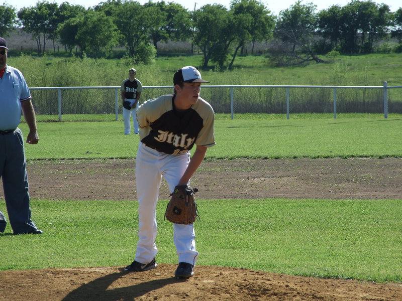 Image: Justin Buchanan — Buck waits for his pitch from catcher, Ryan Ashcraft.