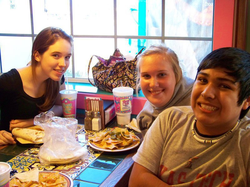 Image: Melissa, Drenda and C.J. — Melissa Smith, Drenda Burk and C.J. Enriquez take a much needed break.