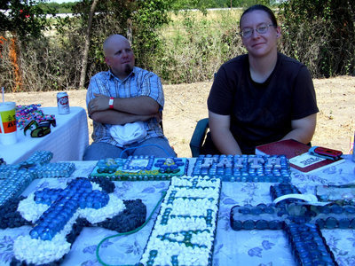 Image: Alisha and Billy Burkes — Alisha does wood art and crafts including plaques and crosses. This is a home business. You can reach her at 972-979-4315 to purchase one of her products.
