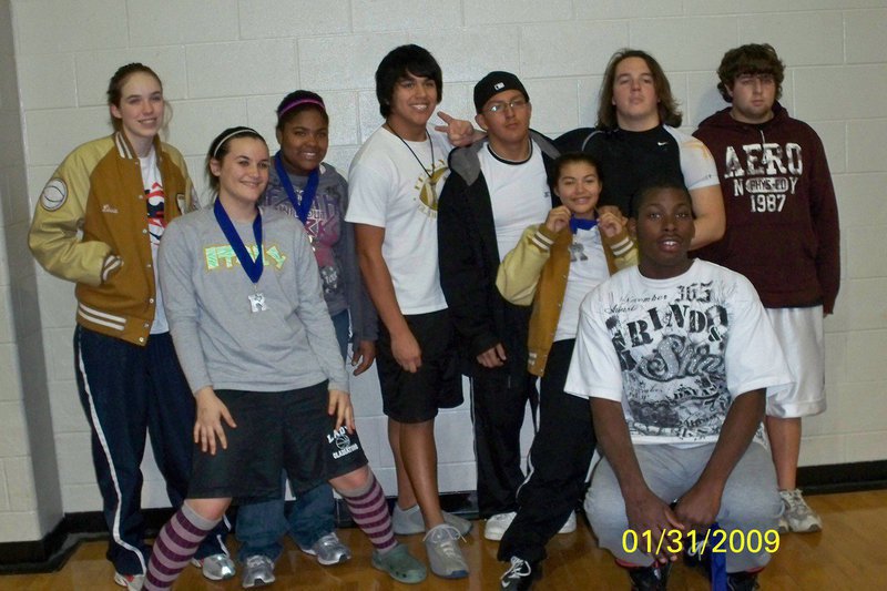 Image: Italy’s Powerlifting Posse — Back row: Melissa Smithey, Sa’Kendra Norwood, Omar Estrada,  Jacob Lopez, Zach Hernandez, and Ivan Roldan.
    Front row: Kaytlyn Bales, Marisela Perez and Curtis Cole.