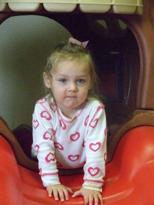 Image: Here she comes — Charlea Padilla is trying out the new equipment at the Happy Heart Child Care center.