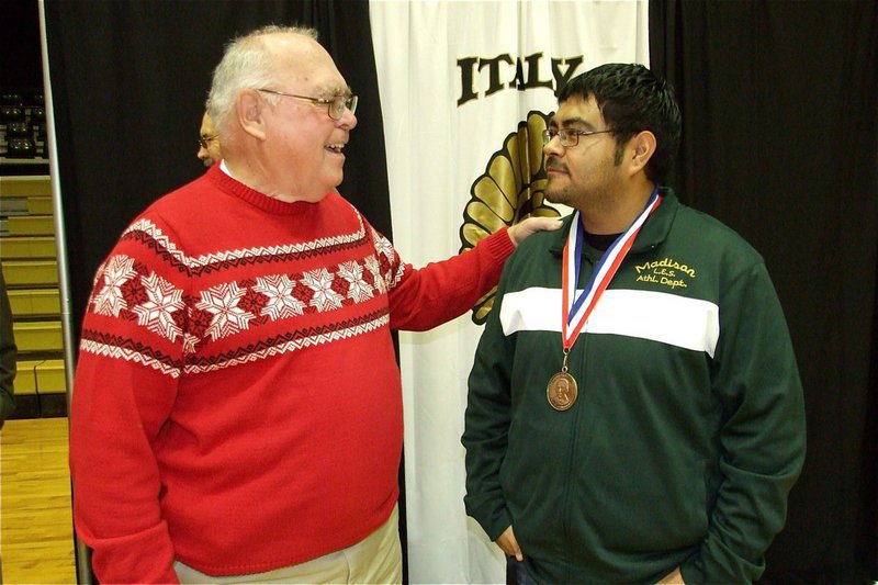 Image: Congratulations for Perez — Italy High School Superintendent Charlie Williams congratulates Jesus Perez on his well deserved honor.