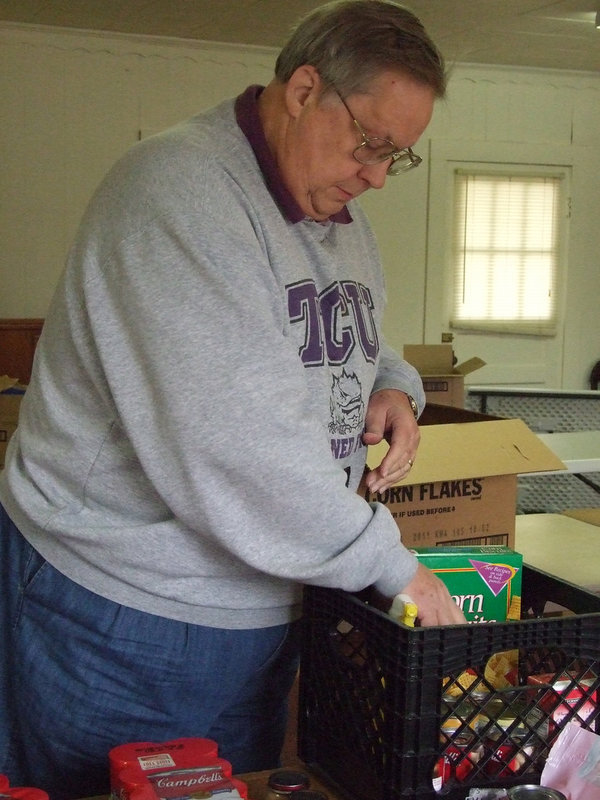 Image: Pastor Bill Morgan — Looks like Pastor Morgan of Family Faith has bagged groceries before.
