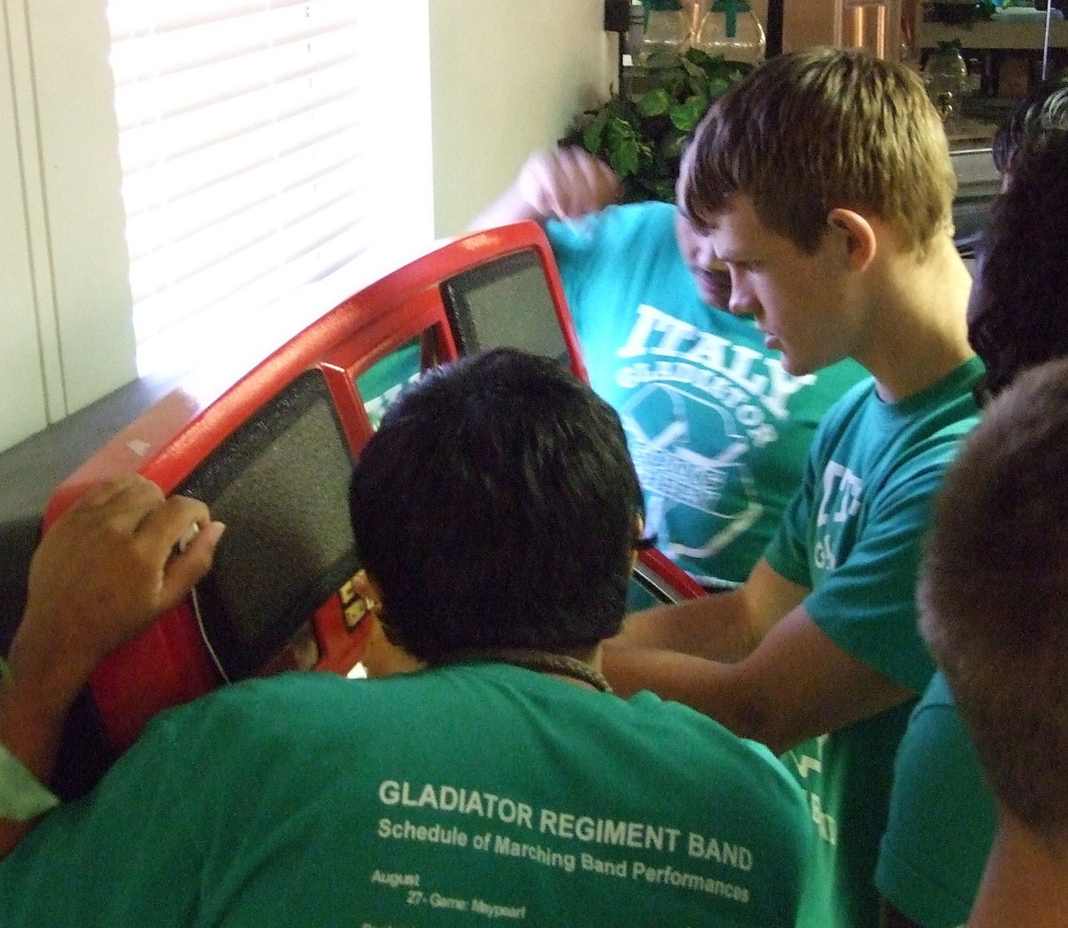 Image: The guys carefully made selections at the juke box….