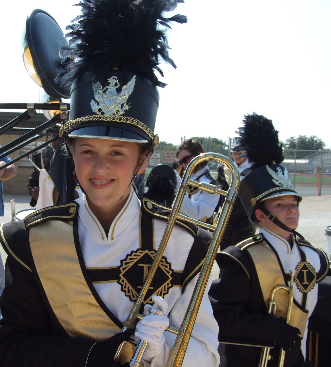 Image: Kelsey and Tara — Kelsey Nelson gives a grin while Tara Wallis looks on.