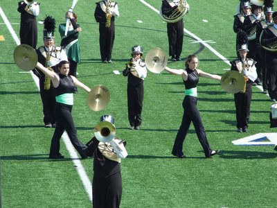 Image: Symmetry on the cymbals — Kaytlyn Bales and Melissa Smithey are in sync with each other and did so thru the entire performance.