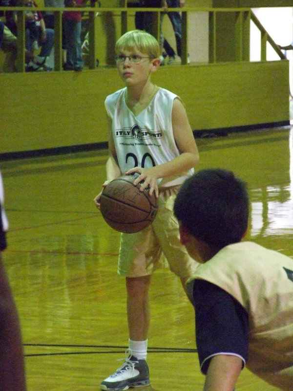 Image: Cody Boyd — Cody Boyd #20 eyes a free shot. Boyd scored 6-points in the contest.