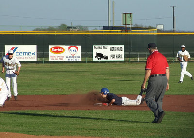 Image: He’s Only Safe Now — The Gladiators picked this Eagle off in the first inning.
