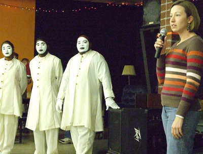 Image: Rev. Krista Ingram — Rev. Ingram instructed the Mime Troupe to help with the offering.