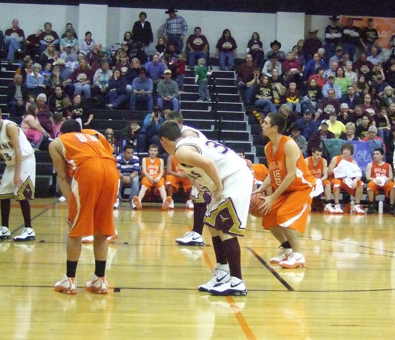 Image: SENIOR #5 — William Cockerham #5 sinks his freethrows to add points to the scoreboard against Forestburg.