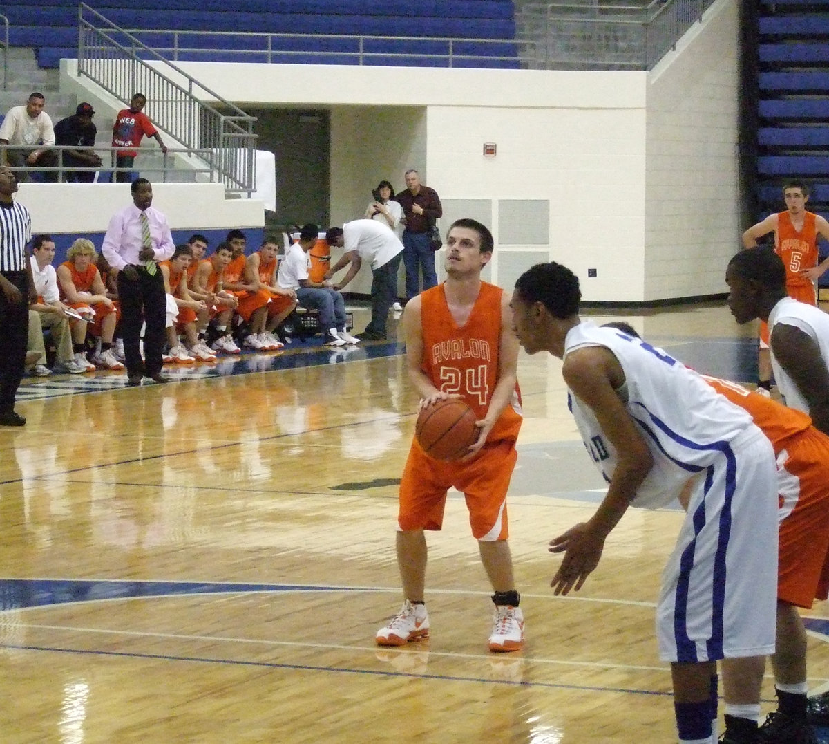Image: SENIOR #24 — David takes his time shooting his freethrows in the Avalon vs. Milford game.
