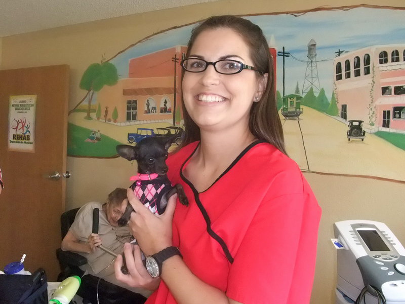 Image: Darla Gardner & Lisa Marie — Darla Gardner (director of therapy) is happy with the results she is seeing in the residents because of Lisa Marie.