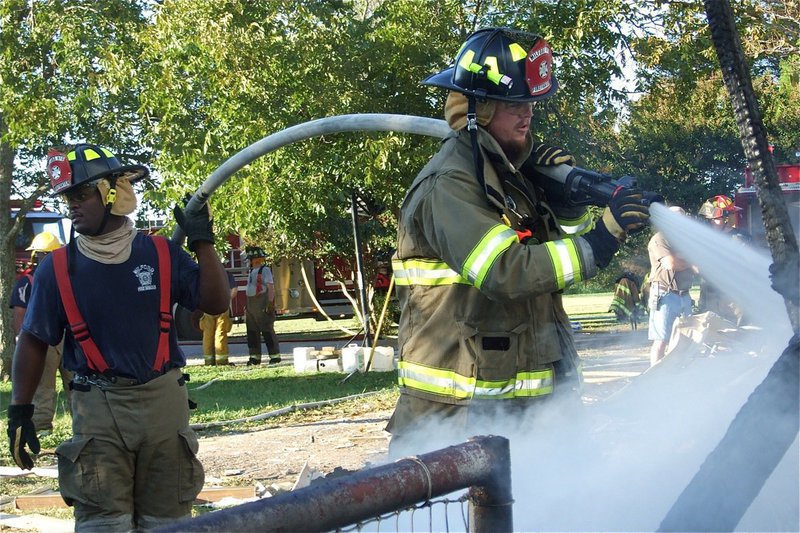 Image: Manning the hose