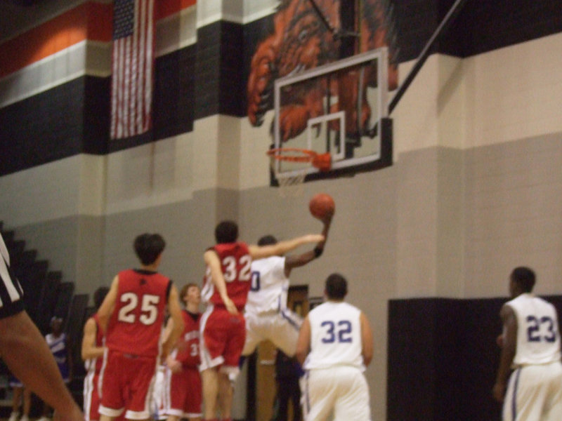 Image: Two easy — #0 McGruder makes it look easy as he flies through the lane for 2-points.
