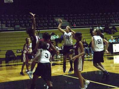 Image: Richards Flips — Italy’s #42 Alyssa Richards flips up a shot against the Lady Eagles.