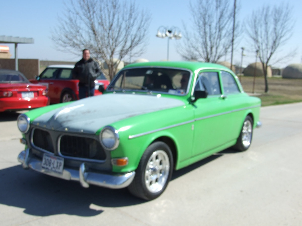 Image: Green Jaguar — This kelly green Jaguar brightened up the road.