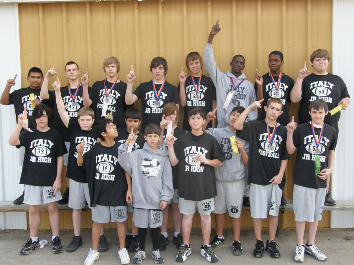 Image: 8th Grade Boys — The 8th Grade Boys 2009 Track Team are basking in the sun as they display their winnings after the meet hosted by Dallas Gateway.