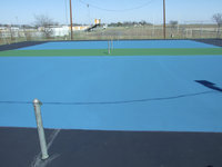 Image: New tennis court — The tennis court has been refurbished with a local donation.