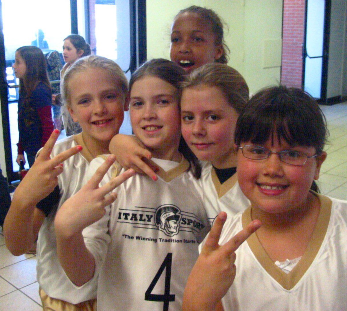 Image: Team Haight — Team Haight celebrates after their win over Hillsboro Light Pink.