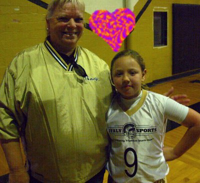 Image: Rita and Brycelin — All-star Brycelin Richards shares this special moment with her Grandmother, Rita Garza.
