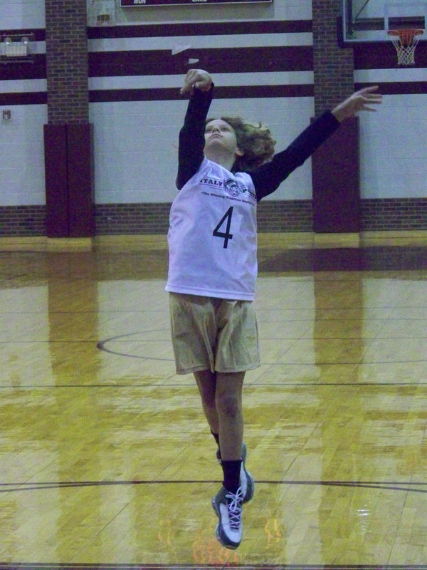 Image: And one, and two… — McKenzie Goodwin is a ball-erina at the free throw line.