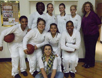 Image: Beauties And Braun — District has begun for the Lady Gladiators. They hosted Itasca at the dome Friday night.
(Back row L-R) Jimesha Reed, Becca DeMoss, Kaitlyn Rossa, Megan Richards and Coach McDonald. (Second row L-R) Kyonne Birdsong, Blanca Figueroa, Marisela Periz and Jaleecia Fleming. (On the floor) Manager, Molly Haight.