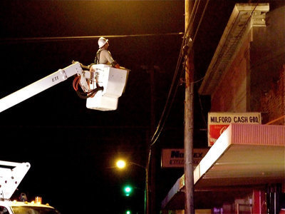 Image: Oncor® on hand — Oncor® arrives on the scene to disconnect the electricity.