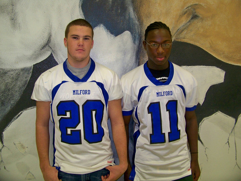 Image: All District Honorable Mention — Ethan Burk #20, Lee Smith #11 are two of the Milford football players that received honors for the Bulldogs.