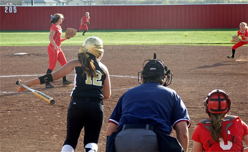 Image: Ground ball — Italy’s Alyssa Richards(12) belts a grounder towards Mayearl’s second baseman.