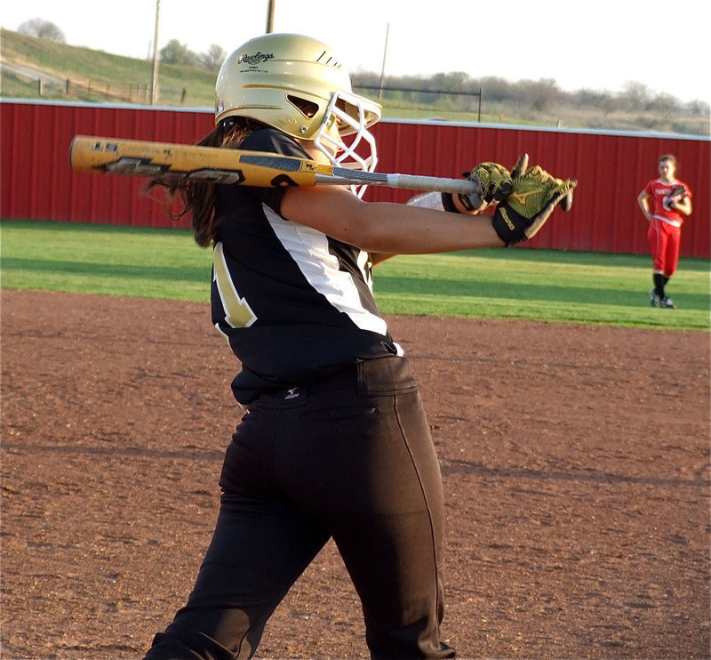 Image: Getting in rhythm — Lady Gladiator Anna Viers takes a practice swing before stepping into the batter’s box.