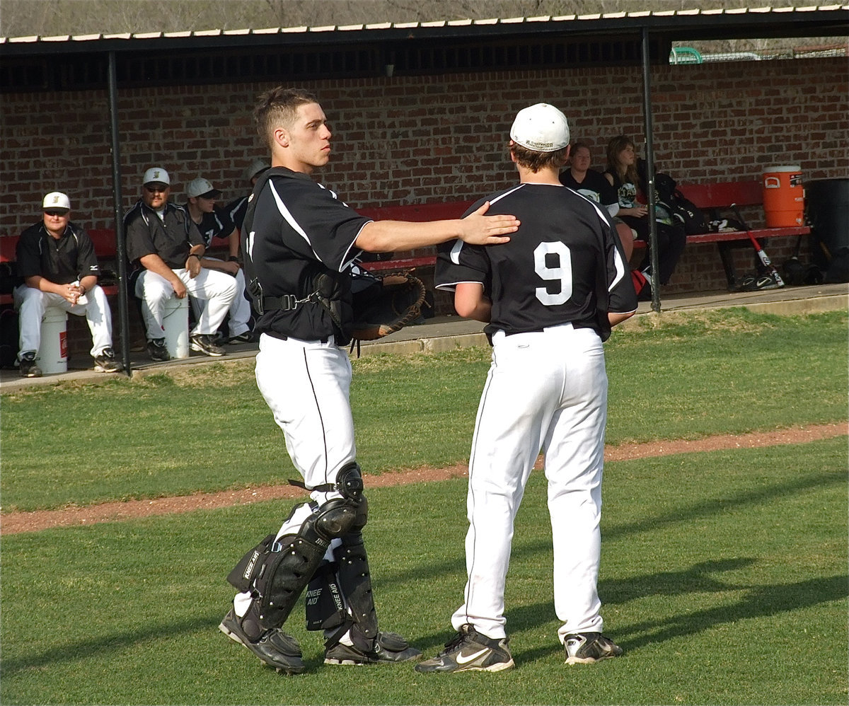 Image: Pep talk — Italy’s catcher, Brandon Souder, encourages his freshman pitcher, Bailey Walton, and helps Walton get back on track.