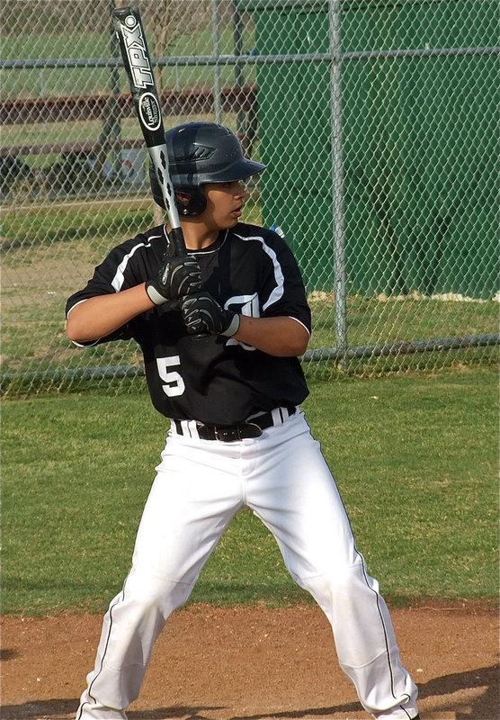 Image: Just before impact — Italy’s Reid Jacinto spots his pitch.