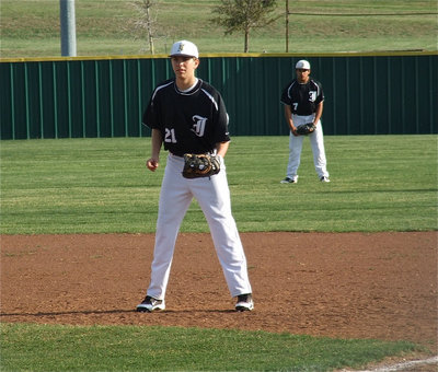 Image: Let’s play ball — Cole Hopkins(21) and Omar Estrada(7) are ready on defense.