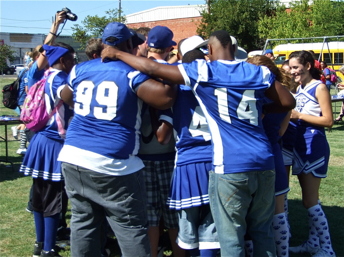 Image: The team chants