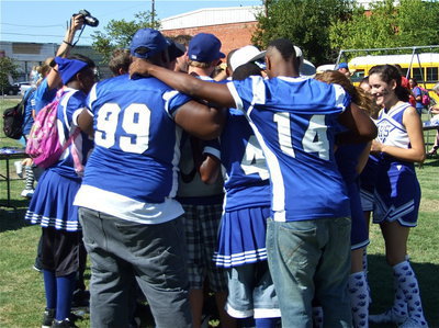 Image: The team chants