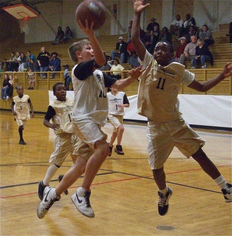 Image: Caden and Cameron, they’re like two fighter jets — Italy 30’s Caden Petrey(10) launches an air assault at Italy 29’s goal while Cameron Carter(11) tries to shoot him down in Thursday nights finale.