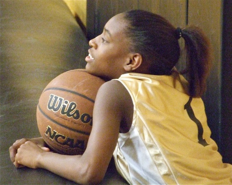 Image: Calm before the chaos — Italy 24’s DeCorea Green(1) takes a moment relax before the big game.